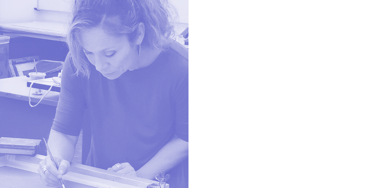 Irene painting with a brush onto a screen.