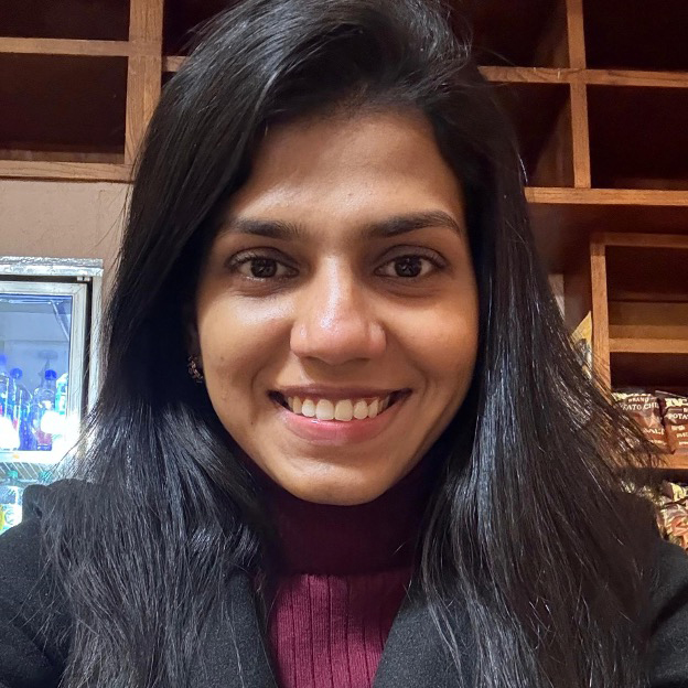 aditi headshot smiling